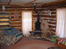 Livingroom has hide-a-bed couch.